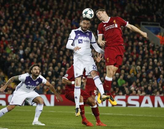 James Milner of Liverpool climbs with Gregor Bajde of NK Maribor during the Champions League Group E match at Anfield Stadium, Liverpool. Picture date: November 1st 2017. Picture credit should read: Andrew Yates Sportimage EDITORIAL USE ONLY. No use with unauthorised audio, video, data, fixture lists, club league logos or live services. Online in-match use limited to 120 images, no video emulation. No use in betting, games or single club league player publications.