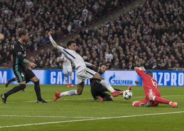 Football - 2017 2018 UEFA Champions League - Group H: Tottenham Hotspur vs. Real Madrid Dele Alli (Tottenham FC) beats Nacho Fernandez (Real Madrid) and Kiko Casilla (Real Madrid) to the cross to open the scoring at Wembley Stadium. COLORSPORT DANIEL BEARHAM  csp_tot_rma_011117_