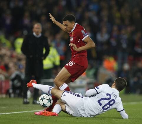 Trent Alexander-Arnold of Liverpool tackled by Mitja Viler of NK Maribor during the Champions League Group E match at Anfield Stadium, Liverpool. Picture date: November 1st 2017. Picture credit should read: Andrew Yates Sportimage EDITORIAL USE ONLY. No use with unauthorised audio, video, data, fixture lists, club league logos or live services. Online in-match use limited to 120 images, no video emulation. No use in betting, games or single club league player publications.