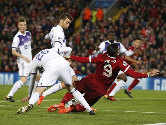 Roberto Firmino of Liverpool brought down to earn a penalty during the Champions League Group E match at Anfield Stadium, Liverpool. Picture date: November 1st 2017. Picture credit should read: Andrew Yates Sportimage EDITORIAL USE ONLY. No use with unauthorised audio, video, data, fixture lists, club league logos or live services. Online in-match use limited to 120 images, no video emulation. No use in betting, games or single club league player publications.
