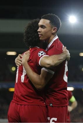 Mohamed Salah of Liverpool celebrates scoring with provider Trent Alexander-Arnold of Liverpool during the Champions League Group E match at Anfield Stadium, Liverpool. Picture date: November 1st 2017. Picture credit should read: Andrew Yates Sportimage EDITORIAL USE ONLY. No use with unauthorised audio, video, data, fixture lists, club league logos or live services. Online in-match use limited to 120 images, no video emulation. No use in betting, games or single club league player publications.