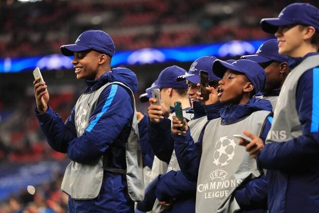 1st November 2017, Wembley Stadium, London, England; UEFA Champions League, Tottenham Hotspur versus Real Madrid; Champions League ball boys video Real Madrid warming up on their phones  ActionPlus11947070