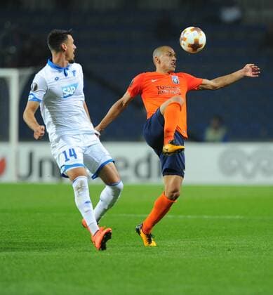 Gokhan Inler (R) of Basaksehir and Sandro Wagner (L) of Hoffenhein during the UEFA Europa League group C match between Istanbul Basaksehir and Hoffenheim at Basaksehir Fatih Terim Stadium in Istanbul, Turkey, on November 02, 2017. 