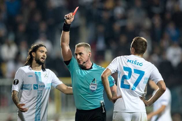 SOCCER - UEFA EL, Rijeka vs A.Wien RIJEKA,CROATIA,02.NOV.17 - SOCCER - UEFA Europa League, group stage, HNK Rijeka vs FK Austria Wien. Image shows Leonard Zuta (Rijeka), referee Jakob Kehlet (DEN) and Josip Misic (Rijeka). GEPAxpictures xMaticxKlansek