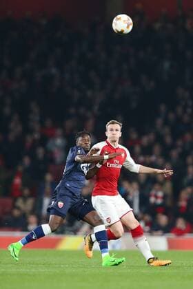 FC Red Star BelgradeÕs Mitchell Donald and Rob Holding of Arsenal during the UEFA Europa League Group H match at the Emirates Stadium, London. Picture date: 2nd November 2017.Pic credit should read: Charlie Forgham-Bailey Sportimage EDITORIAL USE ONLY. No use with unauthorised audio, video, data, fixture lists, club league logos or live services. Online in-match use limited to 120 images, no video emulation. No use in betting, games or single club league player publications.