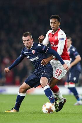 Joe Willock of Arsenal and FC Red Star BelgradeÕs Nenad Krsticic during the UEFA Europa League Group H match at the Emirates Stadium, London. Picture date: 2nd November 2017.Pic credit should read: Charlie Forgham-Bailey Sportimage EDITORIAL USE ONLY. No use with unauthorised audio, video, data, fixture lists, club league logos or live services. Online in-match use limited to 120 images, no video emulation. No use in betting, games or single club league player publications.