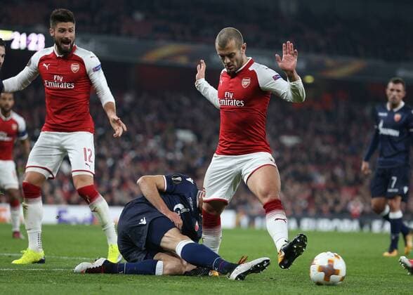 2nd November 2017, Emirates Stadium, London, England; UEFA Europa League group stage, Arsenal versus Red Star Belgrade; Filip Stojkovic of Red Star Belgrade kicking the ball out while intercepting Jack Wilshere of Arsenal in the penalty area  ActionPlus11947168