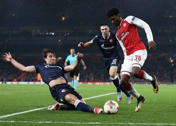 2nd November 2017, Emirates Stadium, London, England; UEFA Europa League group stage, Arsenal versus Red Star Belgrade; Ainsley Maitland-Niles of Arsenal being intercepted by Filip Stojkovic of Red Star Belgrade  ActionPlus11947194