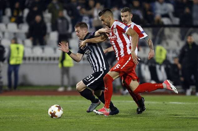 (171103) -- BELGRADE, Nov. 3, 2017 -- Partizan s Ognjen Ozegovic (L) breaks through during the Europa League group B match between Partizan and Skenderbeu in Belgrade, Serbia on Nov. 2. 2017. Partizan won 2-0. ) (SP)SERBIA-BELGRADE-EUROPA LEAGUE-FOOTBALL-PARTIZAN VS SKENDERBEU PredragxMilosavljevic 