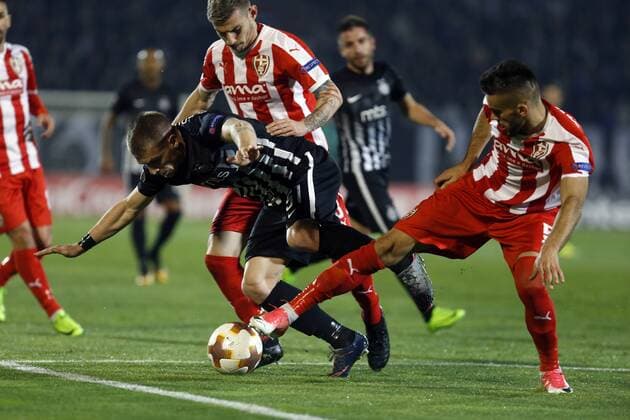 (171103) -- BELGRADE, Nov. 3, 2017 -- Partizan s Ognjen Ozegovic (C) vies with Skenderbeu s Bajram Jashanica (R) during the Europa League group B match in Belgrade, Serbia on Nov. 2. 2017. Partizan won 2-0. ) (SP)SERBIA-BELGRADE-EUROPA LEAGUE-FOOTBALL-PARTIZAN VS SKENDERBEU PredragxMilosavljevic 