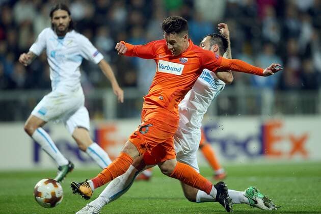 (171103) -- RIJEKA, Nov. 3, 2017 -- Dominik Prokop (C) of Austria Wien competes with Robert Puncec (R) of HNK Rijeka during the UEFA Europa League football match between HNK Rijeka and Austria Wien in Rijeka, Croatia, on Nov. 2, 2017. Austria Wien won 4-1. ) (SP)CROATIA-RIJEKA-UEFA EUROPA LEAGUE-HNK RIJEKA VS AUSTRIA WIEN GoranxStanzl 