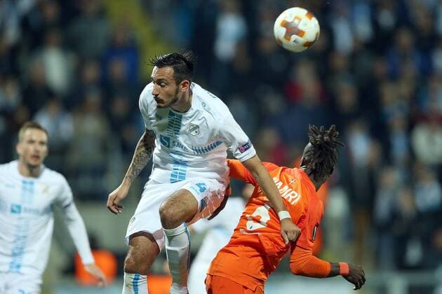 (171103) -- RIJEKA, Nov. 3, 2017 -- Robert Puncec (C) of HNK Rijeka vies with Abdul Kadiri Mohammed (R) of Austria Wien during the UEFA Europa League football match between HNK Rijeka and Austria Wien in Rijeka, Croatia, on Nov. 2, 2017. Austria Wien won 4-1. ) (SP)CROATIA-RIJEKA-UEFA EUROPA LEAGUE-HNK RIJEKA VS AUSTRIA WIEN GoranxStanzl 
