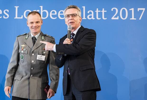 Ceremony with Federal Interior Minister Stefan Wiesner World skydiving champion Surheim 2014 Thomas de Maiziere presents 46 athletes the Silver Laurel Leaf the highest state award for sporting excellence in Germany Stefan Wiesner Thomas de Maiziere