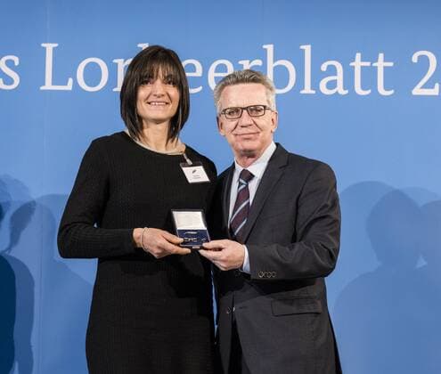 Ceremony with the Federal Minister of the Interior Claudia Eder World Champion curling Thomas de Maiziere hands over 46 athletes the Silver Laurel Leaf the highest state award for sporting excellence in Germany Claudia Eder Thomas de Maiziere