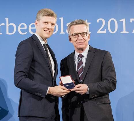 Ceremony with the Federal Minister of the Interior Christian Mader World Champion Curling Thomas de Maiziere hands over 46 athletes the Silver Laurel Leaf the highest state award for sporting excellence in Germany Christian Mader Thomas de Maiziere