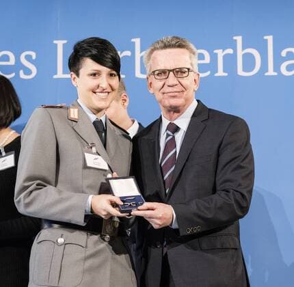 Ceremony with the Federal Minister of the Interior Verena Gotzler curling world champion Thomas de Maiziere presents 46 athletes the silver Laurel leaf the highest state award for sporting excellence in Germany Verena Gotzler Thomas de Maiziere