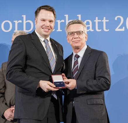 Ceremony with the Federal Minister of the Interior Christoph Dieker World Champion 2012 Rider Tight-wheeled Driving Thomas de Maiziere hands over 46 athletes the Silver Laurel Leaf the highest state award for sporting excellence in Germany Christoph Dieker Thomas de Maiziere