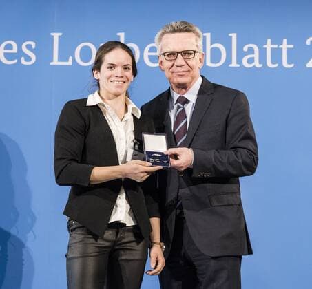 Ceremony with the Federal Minister of the Interior Janika Derks World Champion Dormagen 2014 rider vaulting group Thomas de Maiziere hands over 46 athletes the Silver Laurel Leaf the highest state award for sporting excellence in Germany Janika Derks Thomas de Maiziere