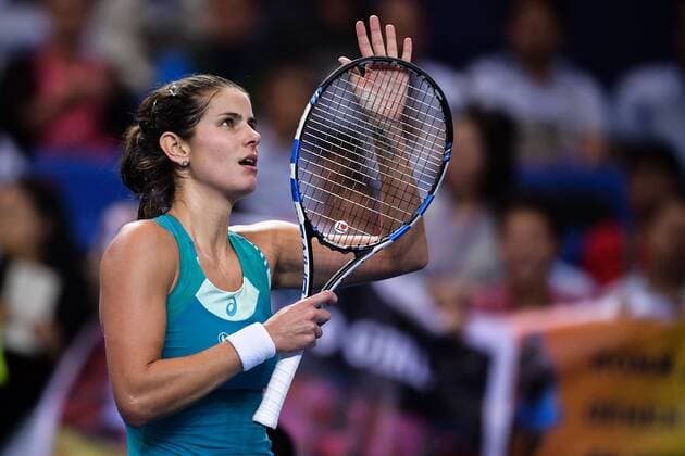 Julia Goerges of Germany celebrates after defeating Kristina Mladenovic of France in the Group A match of the women s singles during the Hengqin Life WTA Tennis Damen Elite Trophy Zhuhai 2017 tennis tournament in Zhuhai city, south China s Guangdong province, 3 November 2017. Julia Goerges defeated Kristina Mladenovic 2-0 (6-2, 7-6). Julia Goerges slashes Kristina Mladenovic during Hengqin Life WTA Elite Trophy Zhuhai 2017  20171103_09597