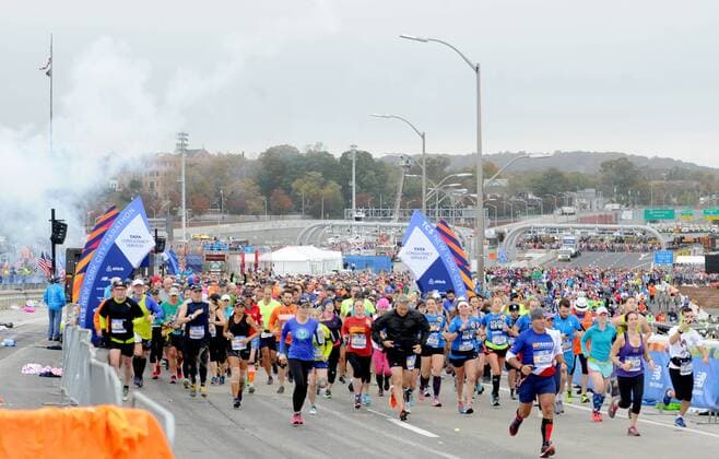 Runners cross the Verrazano Narrows Bridge when they compete in the NYRR TCS New York City Marathon in New York City on November 5, 2017. 50,000 runners from the Big Apple and around the world raced through the five boroughs on a course that winds its way from the Verrazano Bridge before crossing the finish line by Tavern on the Green in Central Park.  NYP20171105211 DENNISxVANxTINE