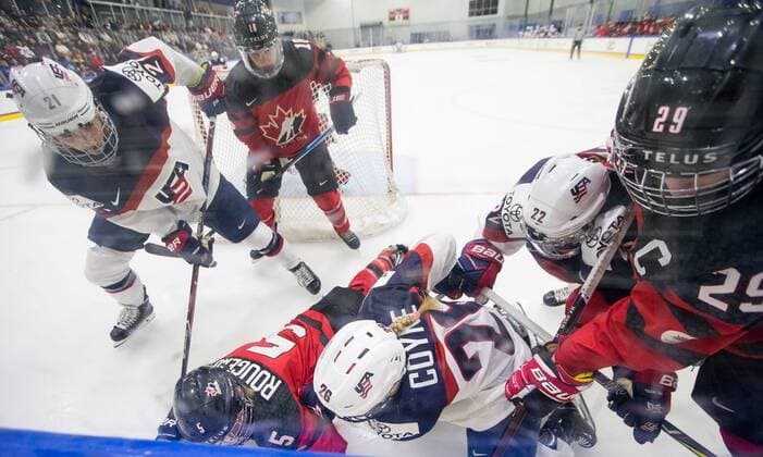 November 8, 2017 - Florida, U.S. - LOREN ELLIOTT Times .Players compete for the puck against the boards during the third period of a Four Nations Cup hockey game between the U.S. Womeno¢s national team Nationalteam and Canada at Florida Hospital Center Ice in Wesley Chapel, Fla., on Wednesday, Nov. 8, 2017. Women s Hockey 2017: Four Nations Cup - ZUMAs70_ 20171108_zan_s70_036 Copyright: xLorenxElliottx