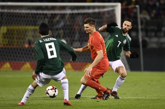Mexico s Hirving Lozano, Belgium s Thomas Meunier and Mexico s Miguel Layun pictured in action during a friendly soccer game between Belgian national team Nationalteam Red Devils and Mexico, Friday 10 November 2017, in Brugge. DIRKxWAEM  x05197898x