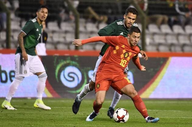 Belgium s Eden Hazard and Mexico s Diego Reyes fight for the ball during a friendly soccer game between Belgian national team Nationalteam Red Devils and Mexico, Friday 10 November 2017, in Brugge. DIRKxWAEM  x05197900x