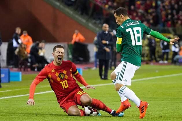 Belgium s Eden Hazard and Mexico s Andres Guardado fight for the ball during a friendly soccer game between Belgian national team Nationalteam Red Devils and Mexico, Friday 10 November 2017, in Brugge. BRUNOxFAHY  x05197905x