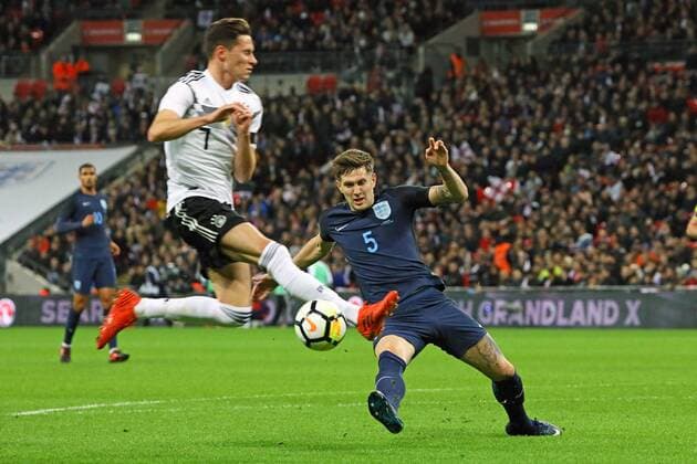 John Stones England just clears Julian Draxler Germany Germany 10 11 2017 England vs Germany Friendly Match Wembley Stadium