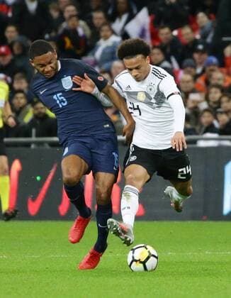 London Football International Match England vs Germany from left Joe Gomez ENG Leroy Sane GER