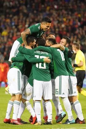 Mexico s Hirving Lozano and his teammates celebrate after scoring during a friendly soccer game between Belgian national team Nationalteam Red Devils and Mexico, Friday 10 November 2017, in Brugge. BRUNOxFAHY  x05198087x