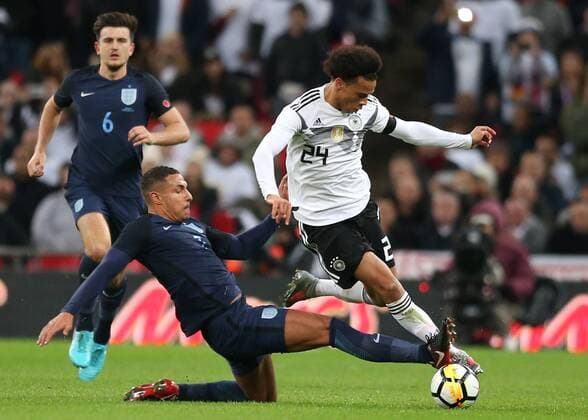 10th November 2017, Wembley Stadium, London, England; International football friendly, England versus Germany; Jake Livermore of England challenges Leroy Sane of Germany  ActionPlus11949245