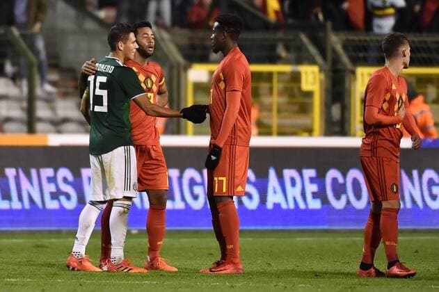 Mexico s Hector Moreno , Belgium s Mousa Dembele and Belgium s Divock Origi embrace at a friendly soccer game between Belgian national team Nationalteam Red Devils and Mexico, Friday 10 November 2017, in Brugge. DIRKxWAEM  x05198137x