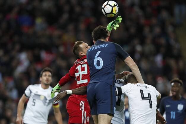 (171111) -- LONDON, Nov. 11, 2017 -- Marc-Andre Ter Stegen (in red), goalkeeper of Germany, vies with Harry Maguire of England during a friendly match between England and Germany at the Wembley Stadium in London, Britain, on Nov. 10, 2017. The match ended in a 0-0 draw. ) (SP)BRITAIN-LONDON-SOCCER-FRIENDLY MATCH-ENG VS GER HanxYan 