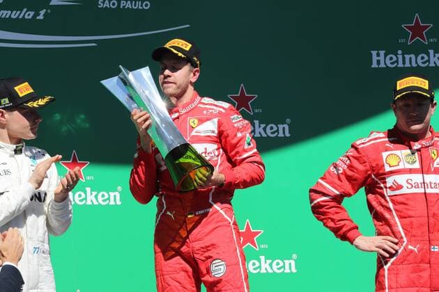 Formel 1, Sebastian Vettel gewinnt GP Brasilien 12.11.2017 - Race, 1st place Sebastian Vettel (GER) Scuderia Ferrari SF70H, 2nd place Valtteri Bottas (FIN) Mercedes AMG F1 W08 and 3rd place Kimi Raikkonen (FIN) Scuderia Ferrari SF70H Brazilian Grand Prix, Sao Paulo, Interlagos 9 - 12 November 2017 12.11.2017 - Race, 1st place Sebastian Vettel (GER) Scuderia Ferrari SF70H, 2nd place Valtteri Bottas (FIN) Mercedes AMG F1 W08 and 3rd place Kimi Raikkonen (FIN) Scuderia Ferrari SF70H 