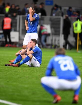 (171114) -- MILAN, Nov. 14, 2017 -- Andrea Belotti (C) and Leonardo Bonucci (Back) of Italy react after the second leg of World Cup 2018 Qualifiers playoff match between Italy and Sweden in Milan, Italy, Nov. 13, 2017. The match ended 0-0. Sweden was qualified for the final stage of 2018 FIFA World Cup WM Weltmeisterschaft Fussball with 1-0 on aggregate. ) (SP)ITALY-MILAN-FOOTBALL-FIFA WORLD CUP QUALIFIER-ITALY VS SWEDEN AlbertoxLingria 