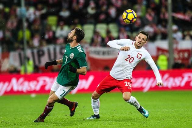November 13, 2017 - Gdansk, Poland - Rafal Wolski (POL) vies Miguel Layun (MEX) during the International Friendly Länderspiel match between Poland and Mexico at Energa Stadium in Gdansk, Poland on November 13, 2017. Poland v Mexico: International Friendly  - ZUMAn230 20171113_zaa_n230_690 Copyright: xFotoxOlimpikx