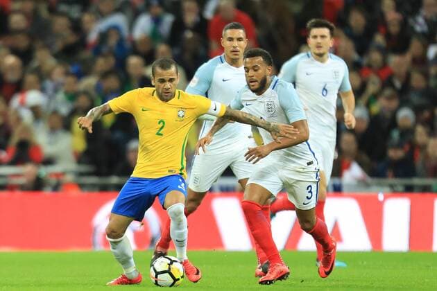 14th November 2017, Wembley Stadium, London, England; International football friendly, England versus Brazil; Dani Alves of Brazil battles with Ryan Bertrand of England  ActionPlus11951281