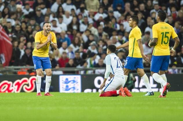 Renato Augusto of Brazil pleads his innocence after committing a foul during the International Friendly Länderspiel match between England and Brazil at Wembley Stadium, London, England on 14 November 2017. Copyright: xDarrenxMusgrovex 17720052