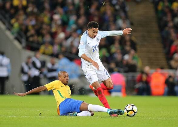 14th November 2017, Wembley Stadium, London, England; International football friendly, England versus Brazil; Jesse Lingard of England is tackled by Fernandinho of Brazil  ActionPlus11951403