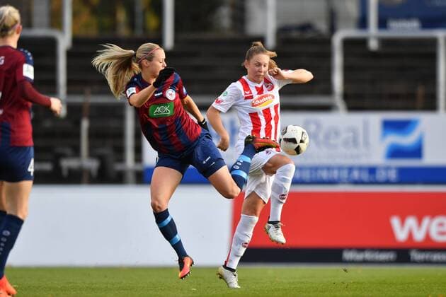 Amanda Ilestedt Potsdam 14 tries to reach the ball in front of Kristina Hild Köln 27 Soccer Allianz Women Bundesliga 1 FC Köln 1 FFC Turbine Potsdam xmkx