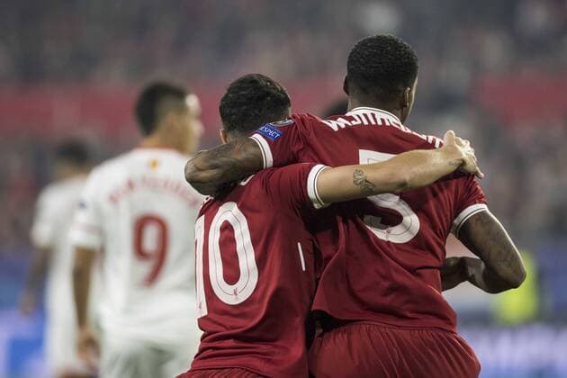 November 21, 2017 - Seville, Spain - GEORGINA WIJNALDUM (R ) and PHILIPPE COUTINHO of Liverpool (L ) celebrate after Liverpool scores 1-0 during the UEFA Champions League Group E soccer match between Sevilla FC and Liverpool FC at Estadio Ramon Sanchez Pizjuan Soccer 2017 - Sevilla FC vs Liverpool FC - ZUMAa142 20171121_zap_a142_002 Copyright: xDanielxGonzalezxAcunax
