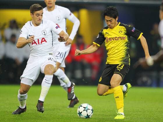 Borussia Dortmund v Tottenham Hotspur UEFA Champions League Shinji Kagawa of Borussia Dortmund and Harry Winks of Tottenham Hotspur during the UEFA Champions League match at Signal Iduna Park, Dortmund Content Not Available For UK Newspapers Copyright: xYannisxHalasx FIL-10982-0021