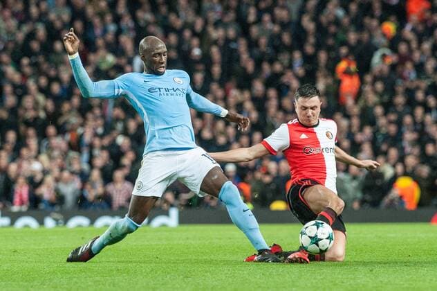 Manchester City v Feyenoord Rotterdam UEFA Champions League Eliaquim Mangala of Manchester City is tackled by Steven Berghuis of Feyenoord Rotterdam during the UEFA Champions League match at the Etihad Stadium, Manchester Content Not Available For UK Newspapers Copyright: xMattxWilkinsonx FIL-10984-0023