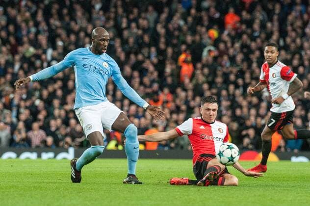 Manchester City v Feyenoord Rotterdam UEFA Champions League Eliaquim Mangala of Manchester City is tackled by Steven Berghuis of Feyenoord Rotterdam during the UEFA Champions League match at the Etihad Stadium, Manchester Content Not Available For UK Newspapers Copyright: xMattxWilkinsonx FIL-10984-0024