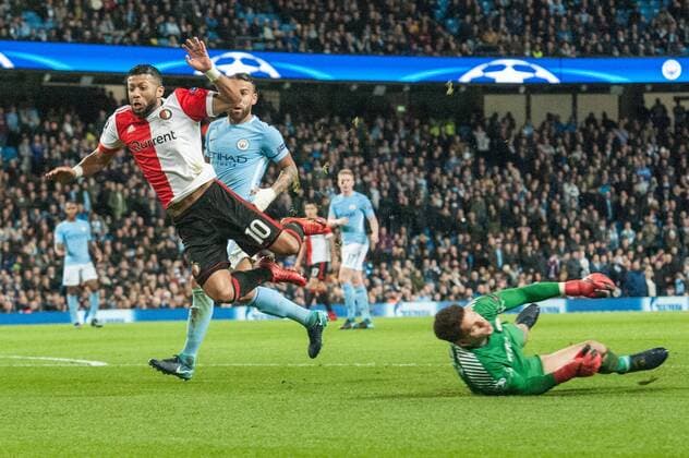 Manchester City v Feyenoord Rotterdam UEFA Champions League Manchester City goalkeeper Ederson sends Tonny Vilhena of Feyenoord Rotterdam flying after a tackle during the UEFA Champions League match at the Etihad Stadium, Manchester Content Not Available For UK Newspapers Copyright: xMattxWilkinsonx FIL-10984-0027