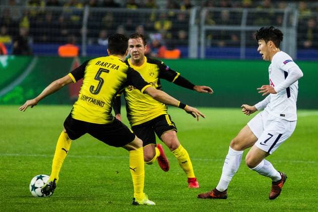 GER UEFA CL Borussia Dortmund GER vs Tottenham Hotspur ENG 21 11 2017 Signal Iduna Park Dortmund GER UEFA CL Borussia Dortmund GER vs Tottenham Hotspur ENG pictured picture shows Heung Min Son Tottenham 7 defeated Marc Bartra Borussia Dortmund 5 and Mario Goetze Borussia Dortmund 10 by nordphotox xRauch nph00251