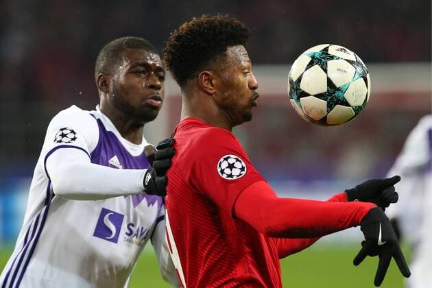 MOSCOW, RUSSIA - NOVEMBER 21, 2017: Maribor s Jean Claude BIllong (L) and Spartak Moscow s Ze Luis in the 2017 UEFA Champions League Group E football match between Spartak Moscow and Maribor at Otkrytiye Arena (Spartak Stadium); the match ended in a 1-1 draw. Anton Novoderezhkin TASS  TS06A009