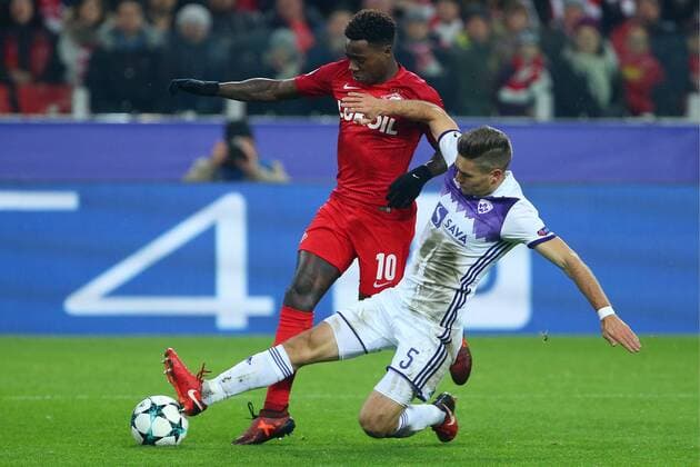 MOSCOW, RUSSIA - NOVEMBER 21, 2017: Spartak Moscow s Quincy Promes (L) and Maribor s Blaz Vrhovec in the 2017 UEFA Champions League Group E football match between Spartak Moscow and Maribor at Otkrytiye Arena (Spartak Stadium); the match ended in a 1-1 draw. Anton Novoderezhkin TASS  TS06A007