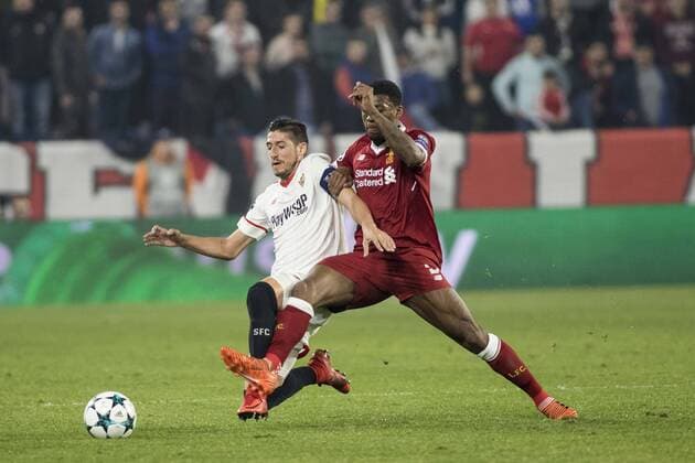 November 21, 2017 - Seville, Spain - SERGIO ESCUDERO of Sevilla (L ) vies for the ball with GEORGINA WIJNALDUM of Liverpool (R) during the UEFA Champions League Group E soccer match between Sevilla FC and Liverpool FC at Estadio Ramon Sanchez Pizjuan Soccer 2017 - Sevilla FC vs Liverpool FC - ZUMAa142 20171121_zap_a142_014 Copyright: xDanielxGonzalezxAcunax